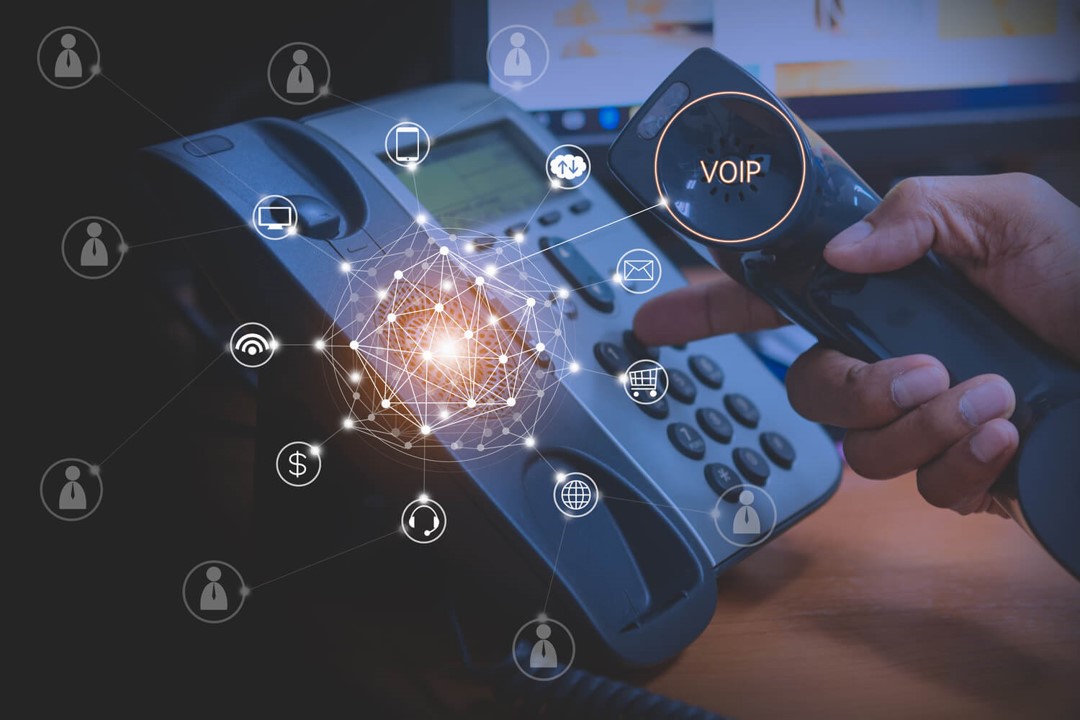 image illustrant le concept de la téléphonie VOIP, fixe et mobile.